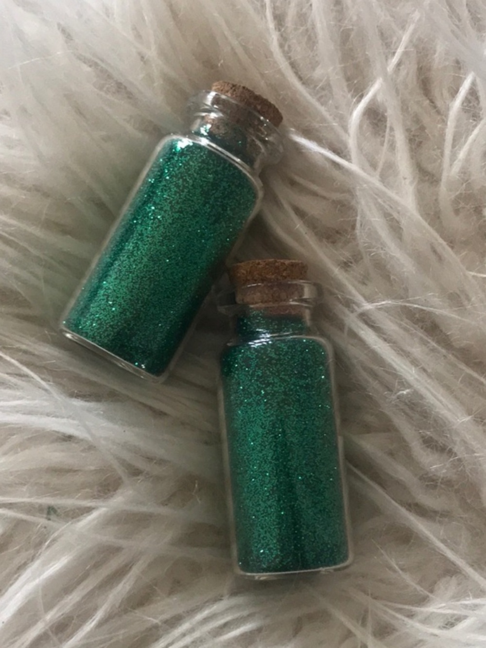 FREE gift with purchase! Emerald green glitter glass bottle
